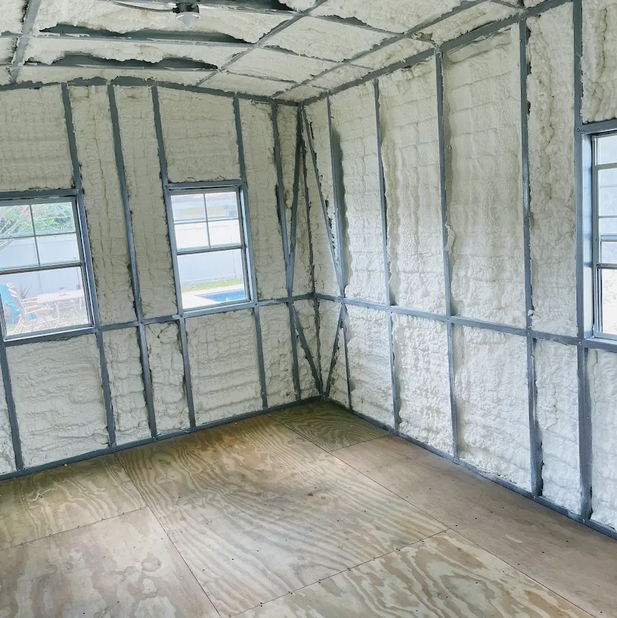 Closed-cell spray foam insulation applied to wall cavities in a residential project in Fitchburg